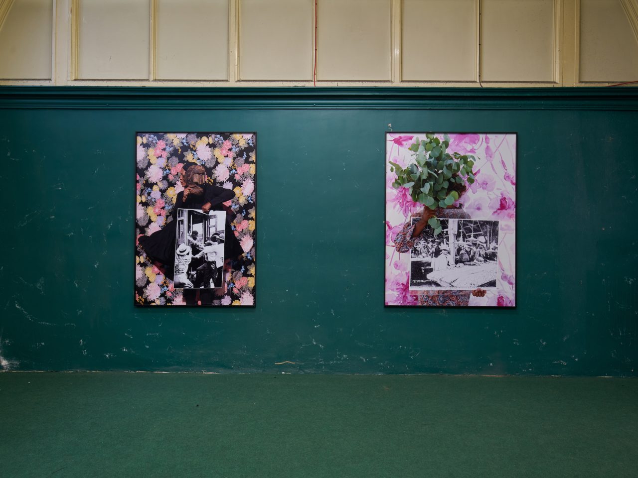 Two large flat artworks on the walls of Cotton Exchange, the artworks have flowery assets to them. The space had dark green walls and a green carpet.