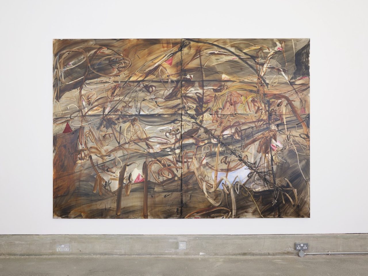 A large brown abstract painting with various brush marks throughout